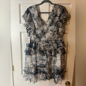 ASOS DESIGN Curve Lace Trim mini dress with ruffle detail in Blurred floral